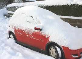 Snow Covered Car