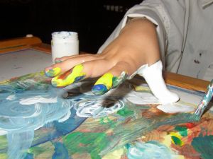 fingerpainting https://twoclassychics.com/2014/05/rising-cost-extra-curricular-activities/