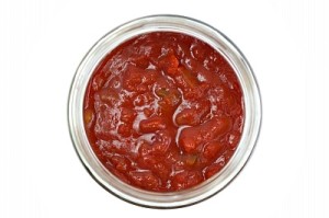 Closeup Of A Chunky Salsa Sauce In A Glass Jar by papaija2008 and freedigitalphotos.net