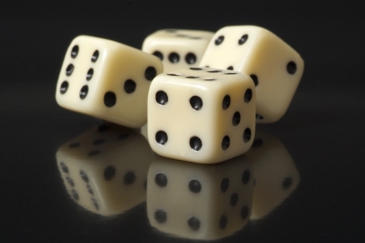 White Dice On A Black Background by m_bartosch freedigitalphotos