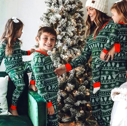 https://twoclassychics.com/wp-content/uploads/2025/08/matching-family-Christmas-pajamas.png