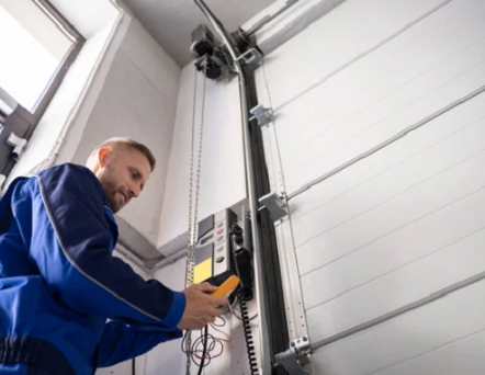 A simple monthly routine can add years to your garage door's lifespan. Here's what homeowners can safely handle, and what to leave to the pros.